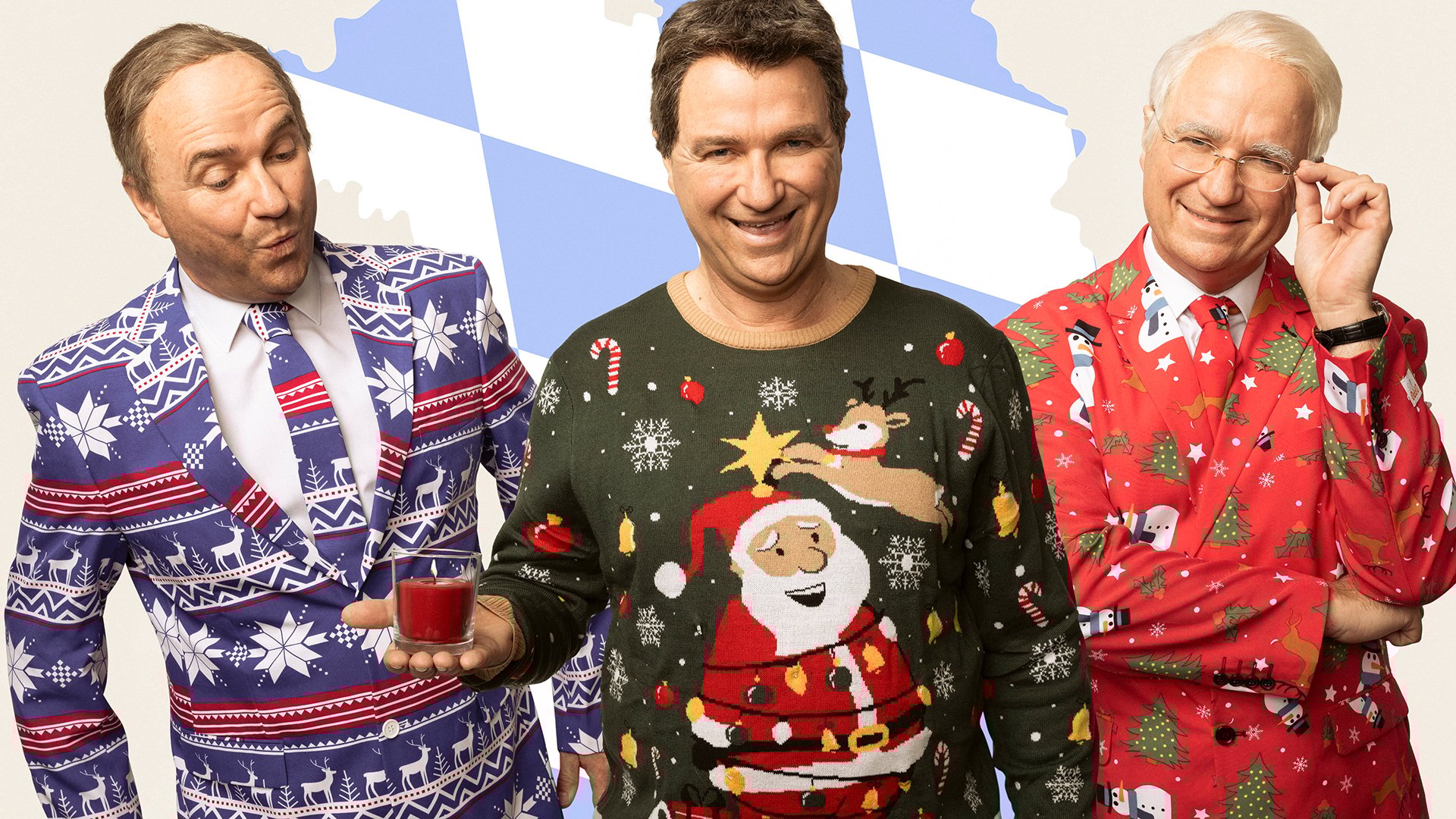 Foto für das Event Wolfgang Krebs – Die Weihnachtsgala: die drei Künstler in weihnachtlicher Kleidung