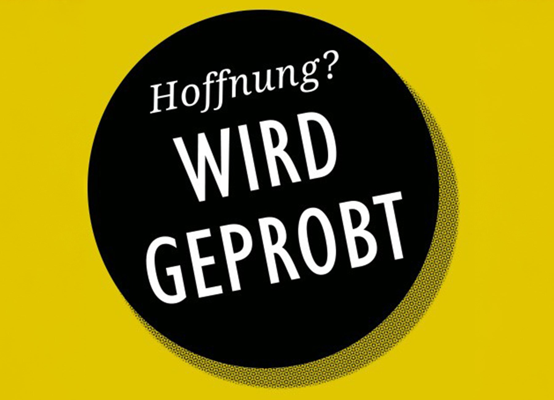 gelbes Plakat mit rundem schwarzen Aufdruck und Aufschrift