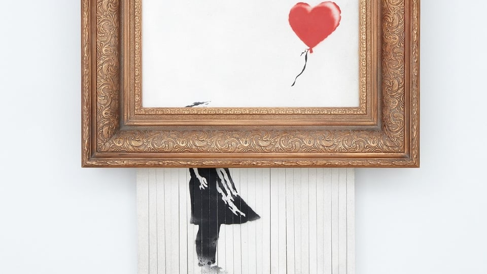 Banksy Kunstwerk vor weißer Wand