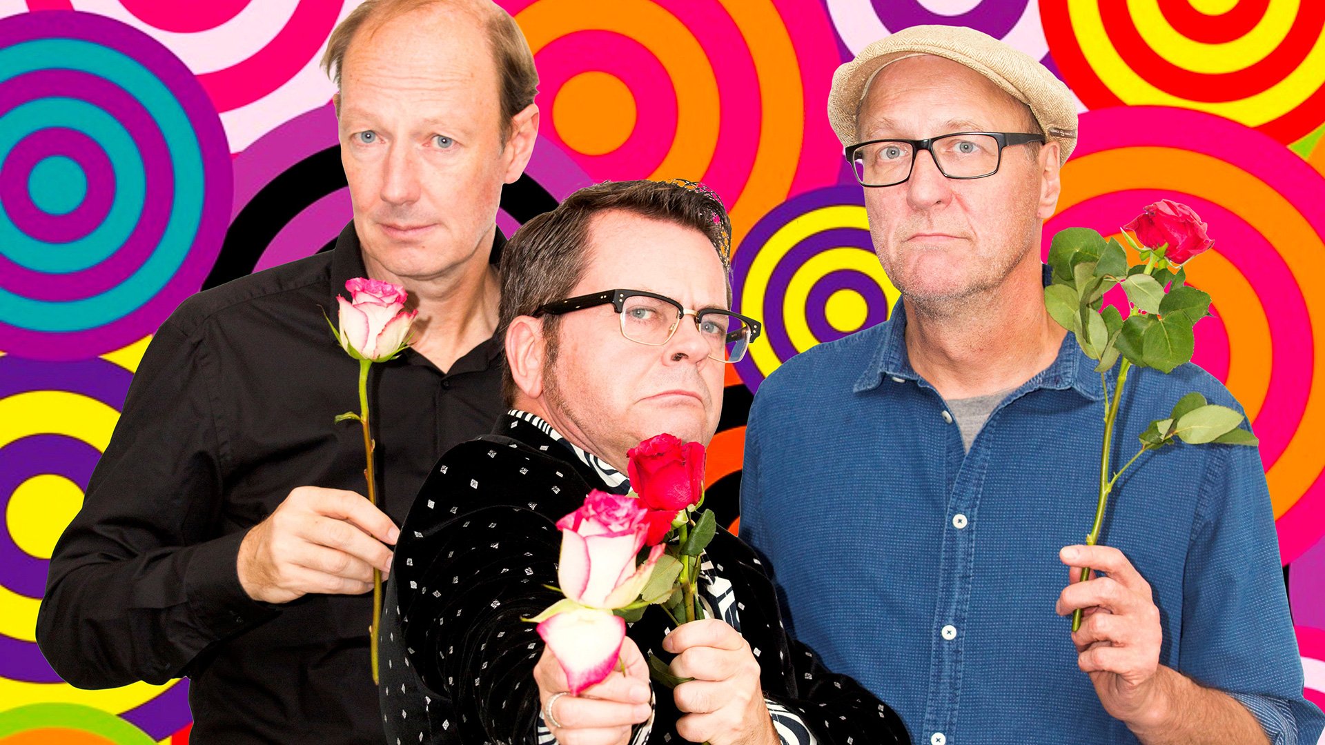 Foto für das Event TITANIC Boygroup - 300 JAHRE KRAWALL FÜR DEUTSCHLAND mit drei Männern und Blumen in den Händen vor einem bunten Hintergrund.