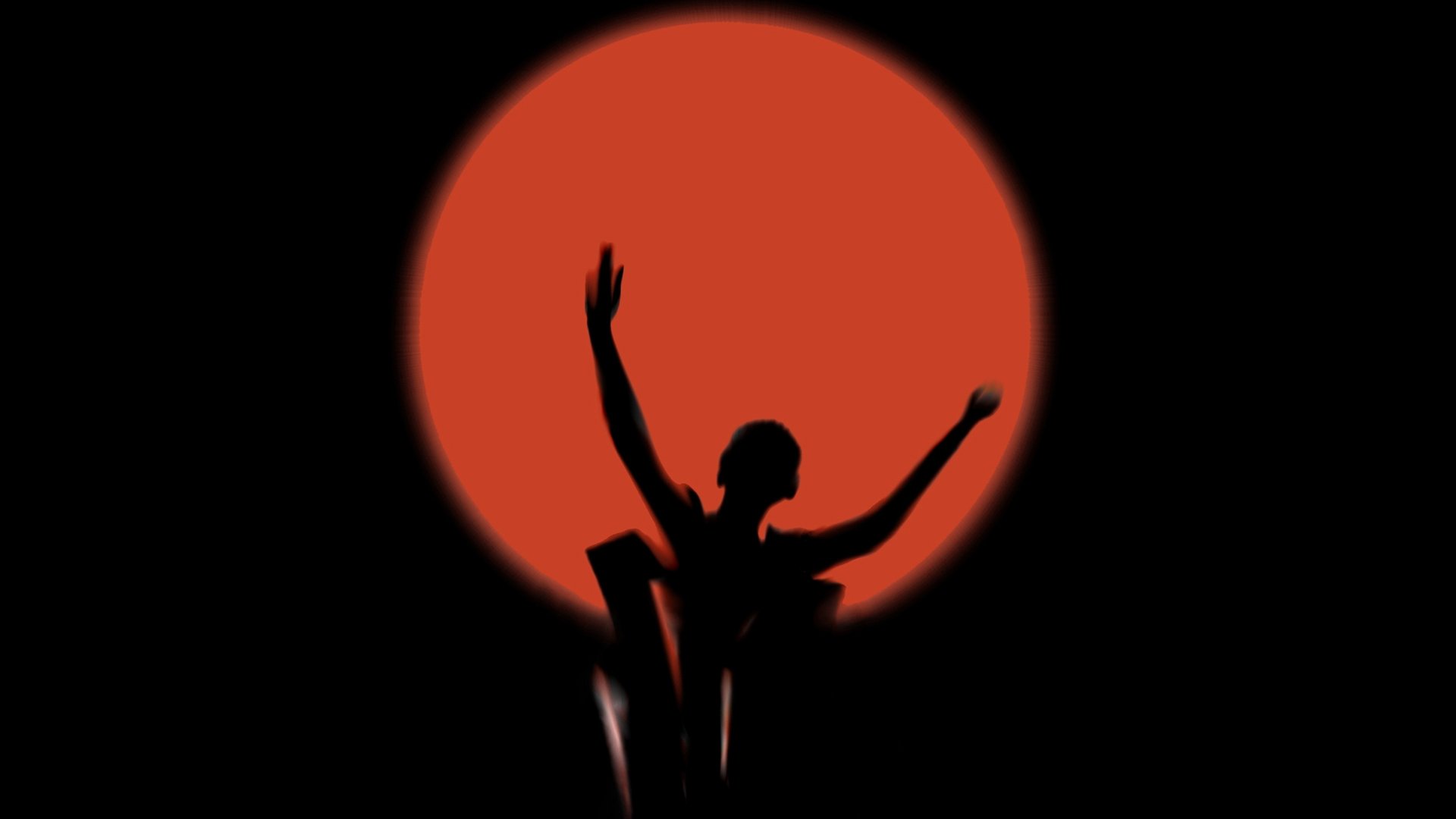 Grafik in schwarz-rot mit Silhouette einer Person, die die Arme in die Luft streckt