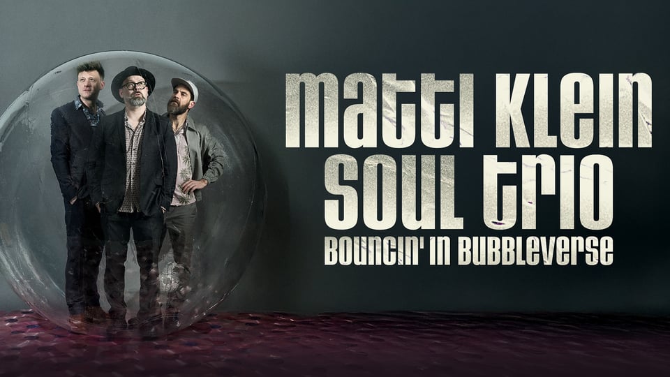 Grafik mit Bild von drei Männern in einer Luftblase und Aufschrift