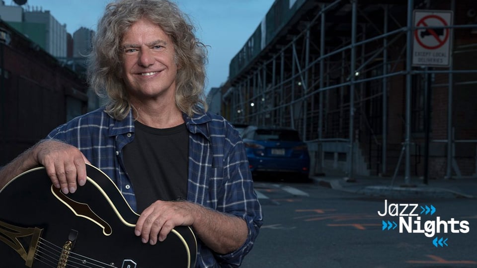 Foto für das PAT METHENY-Event mit dem Künstler und einer Gitarre.