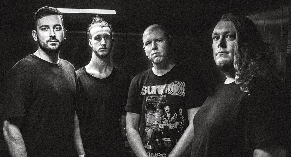 Foto der Gruppe „CONJURER“ in schwarz-weiß mit vier Männern