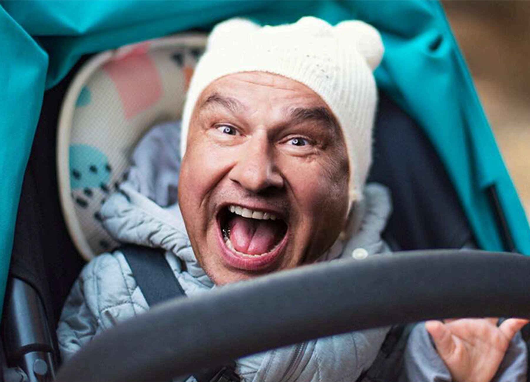 eine Karikatur eines Babys mit dem Gesicht eines Mannes