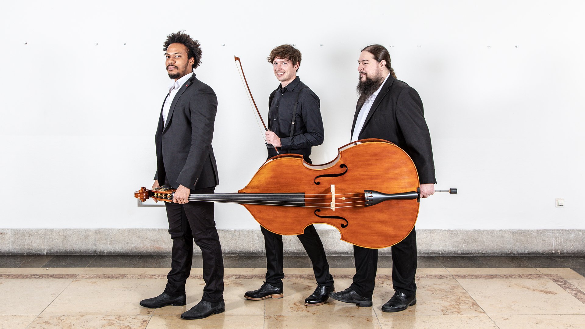 Drei Musiker des Orchesters