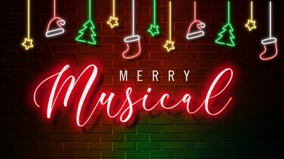 Eine Grafik mit "Merry Musical" als Leuchtreklame und weihnachtliche Dekoration vor einer Ziegelwand