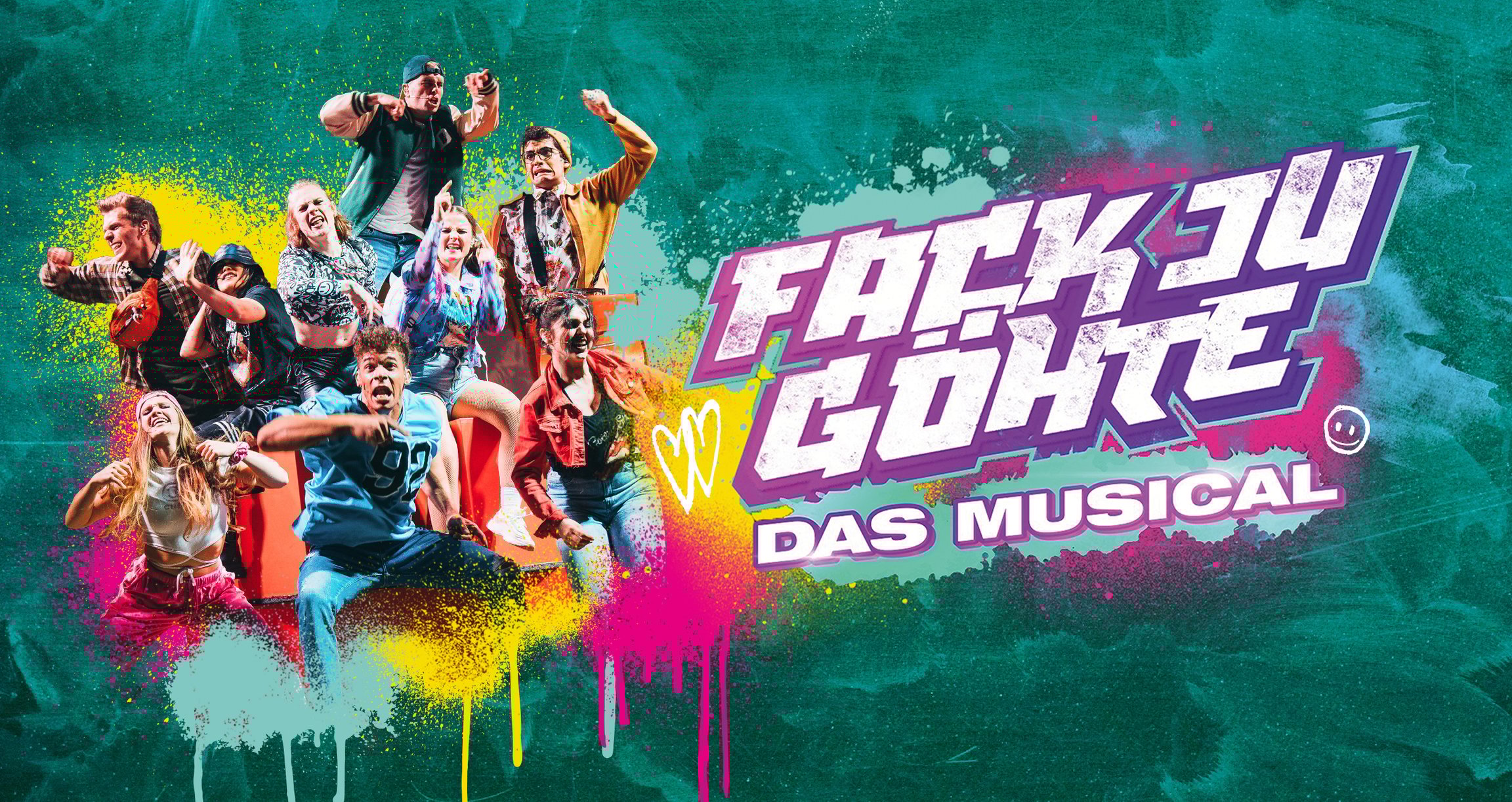 Buntes Plakat mit Bild von Darstellern und Aufschrift