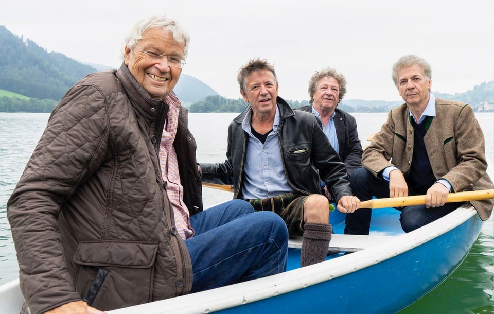 Gerhard Polt und die Well-Brüder auf einem Ruderboot auf einem See